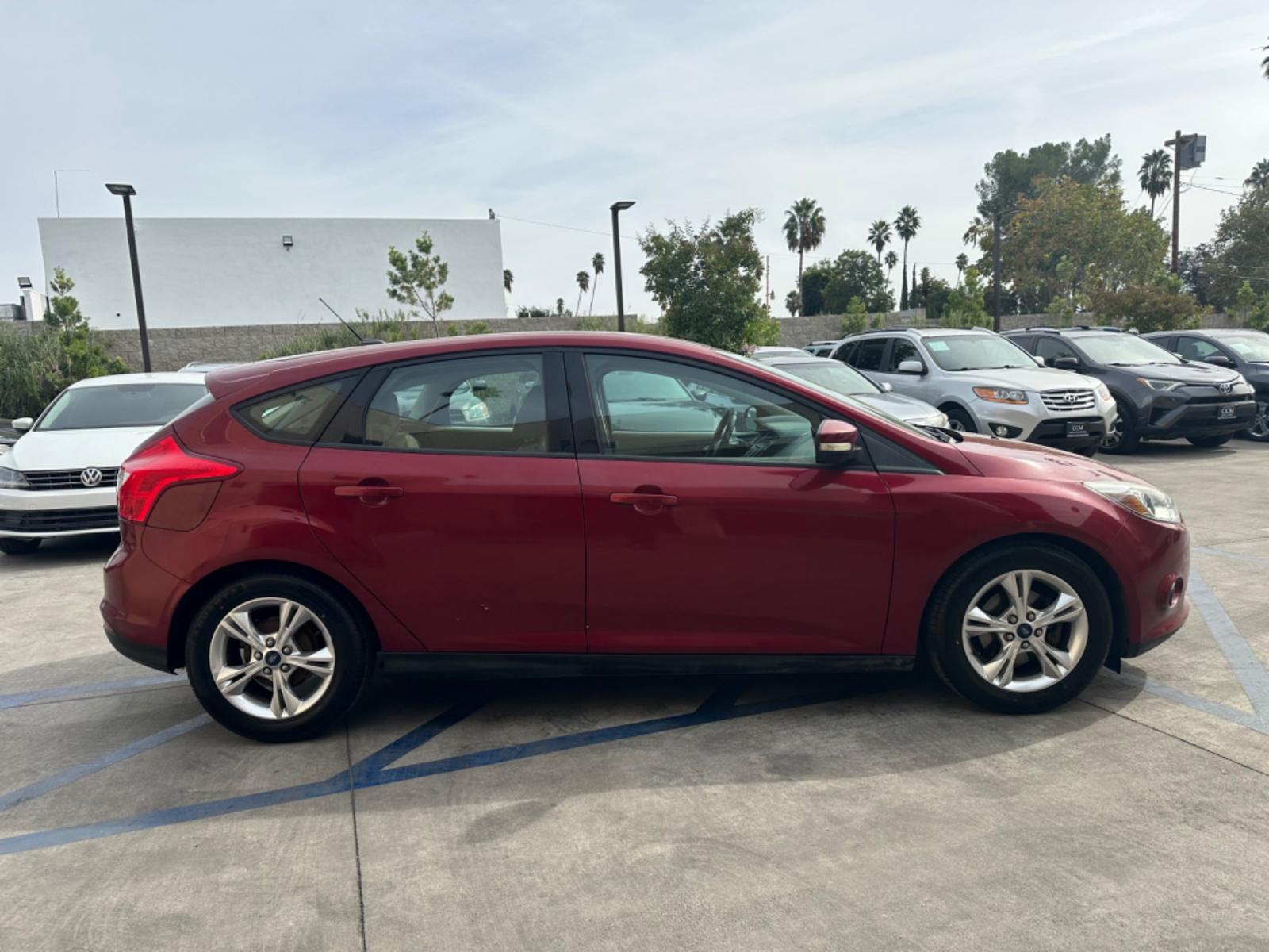 2014 RED /Gray Ford Focus Cloth (1FADP3K24EL) with an 4 Cylinders engine, Automatic transmission, located at 30 S. Berkeley Avenue, Pasadena, CA, 91107, (626) 248-7567, 34.145447, -118.109398 - Good Value! Good MPG! - Photo #5